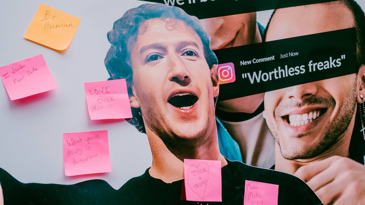 Photo from All Out's offline action targeting Meta. The image shows a cut out of Mark Zuckerberg with handwritten post it notes from passers, including comments like "Make Meta Safe Again."