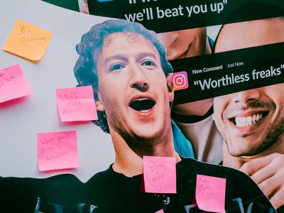 Photo from All Out's offline action targeting Meta. The image shows a cut out of Mark Zuckerberg with handwritten post it notes from passers, including comments like "Make Meta Safe Again."
