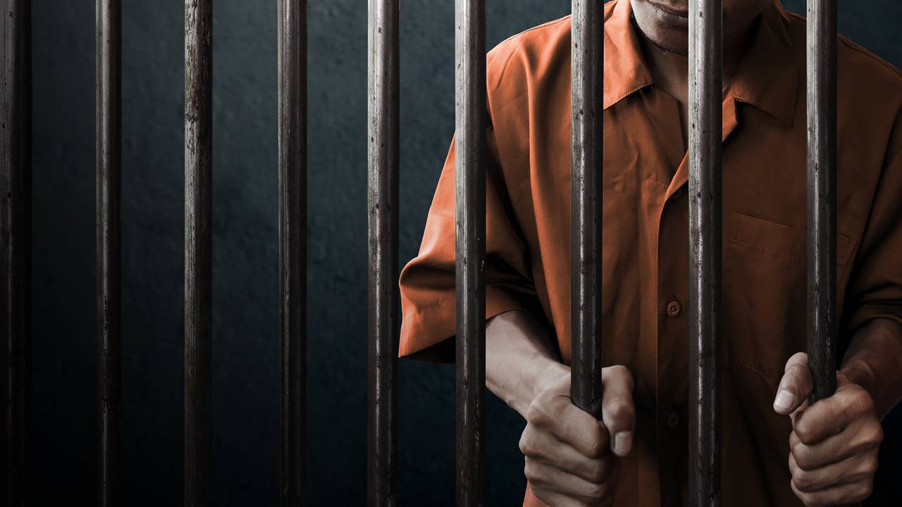 A man behind bars